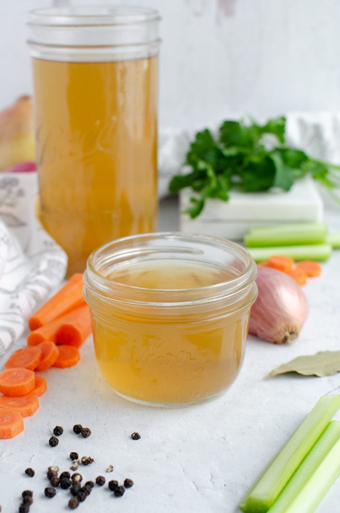 Vegetable broth in a small glass jar