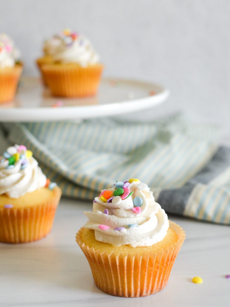 frosted yellow birthday cupcakes