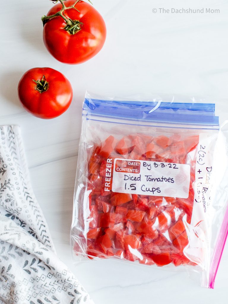 Diced fresh tomatoes in a ziptop bag for freezing