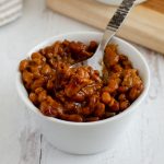 Oven baked beans with vegetarian sausage