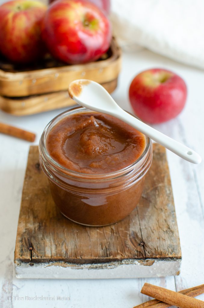 Slow cooker apple butter in a glass jar