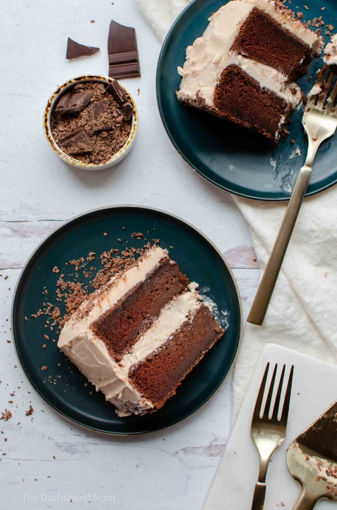 Sliced whiskey chocolate cake frosted with Irish buttercream