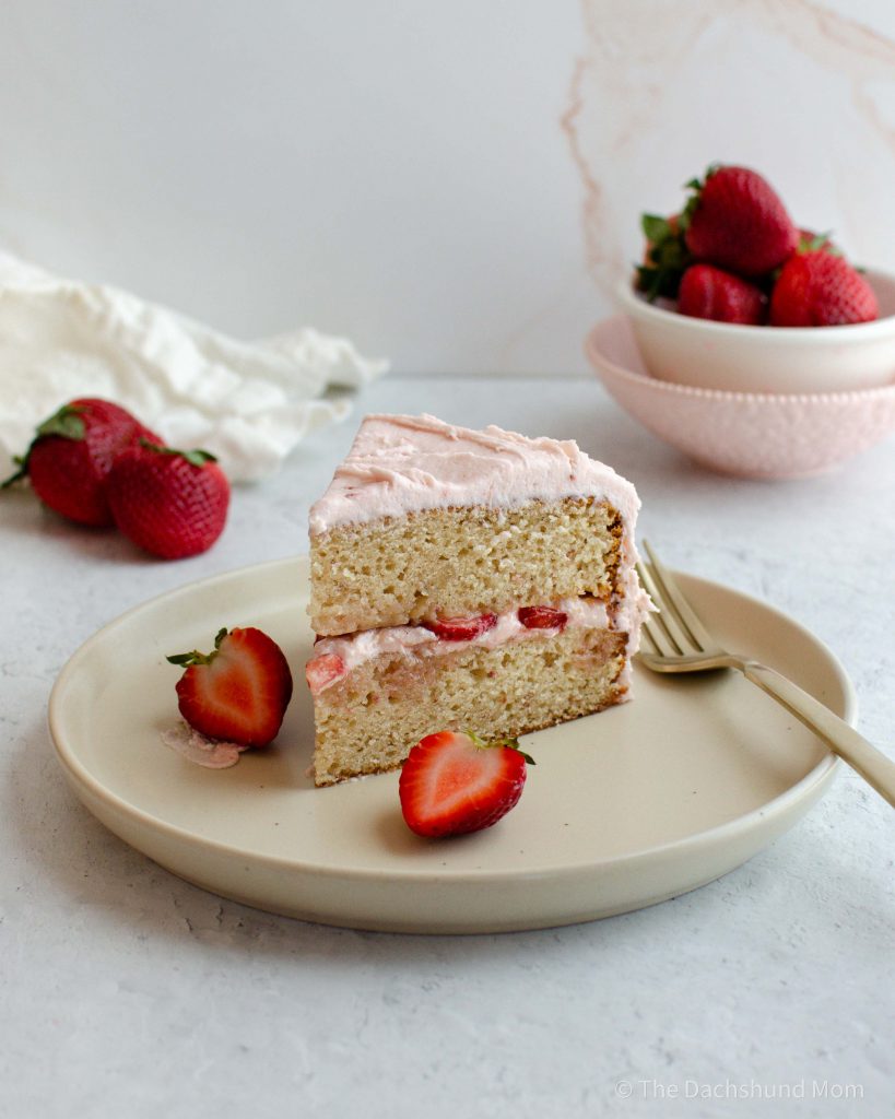Strawberry cake with strawberries in the middle.