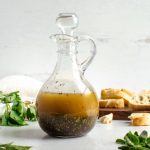 Fresh Herb Vinaigrette in a glass bottle.